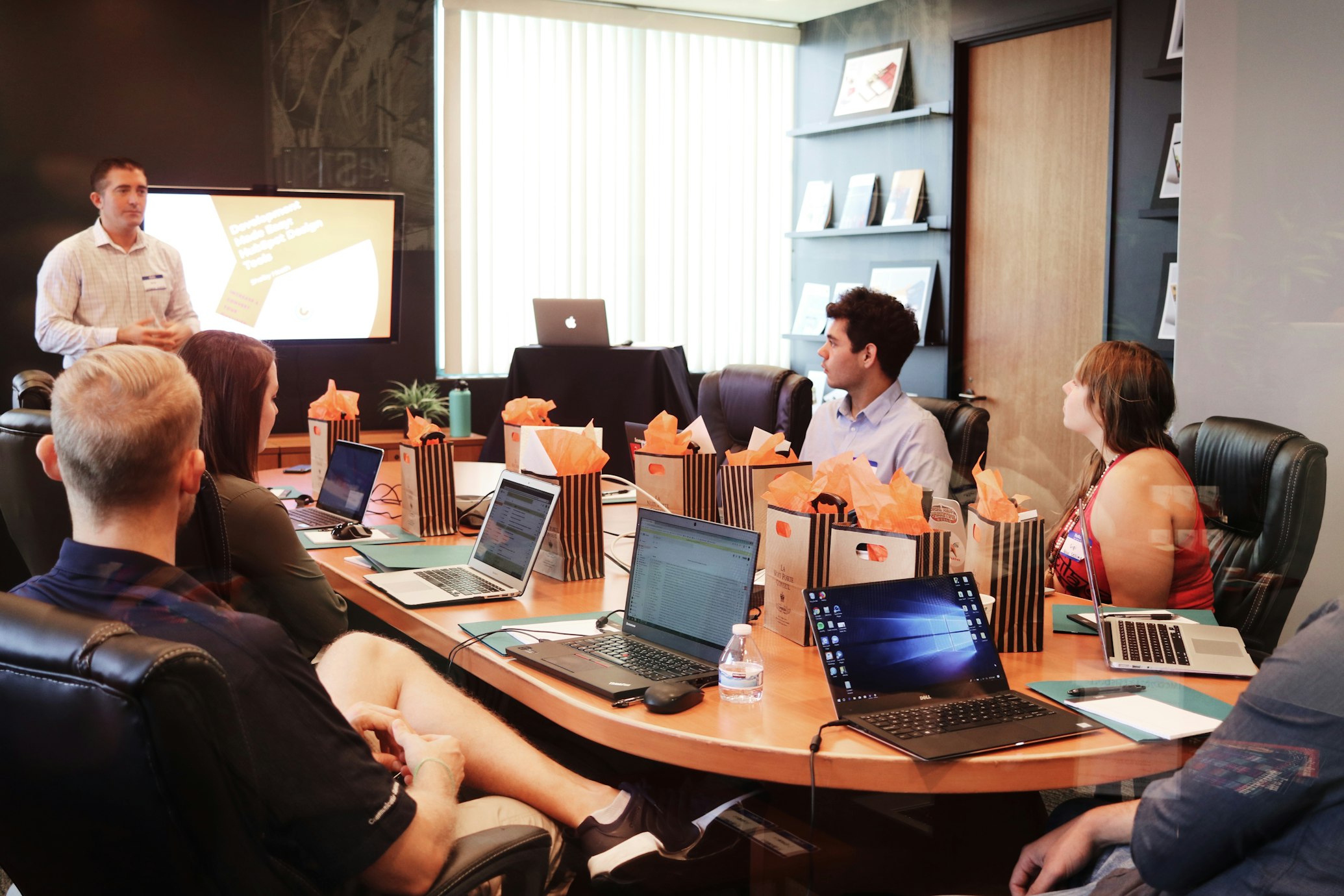 Product team meeting around a conference table