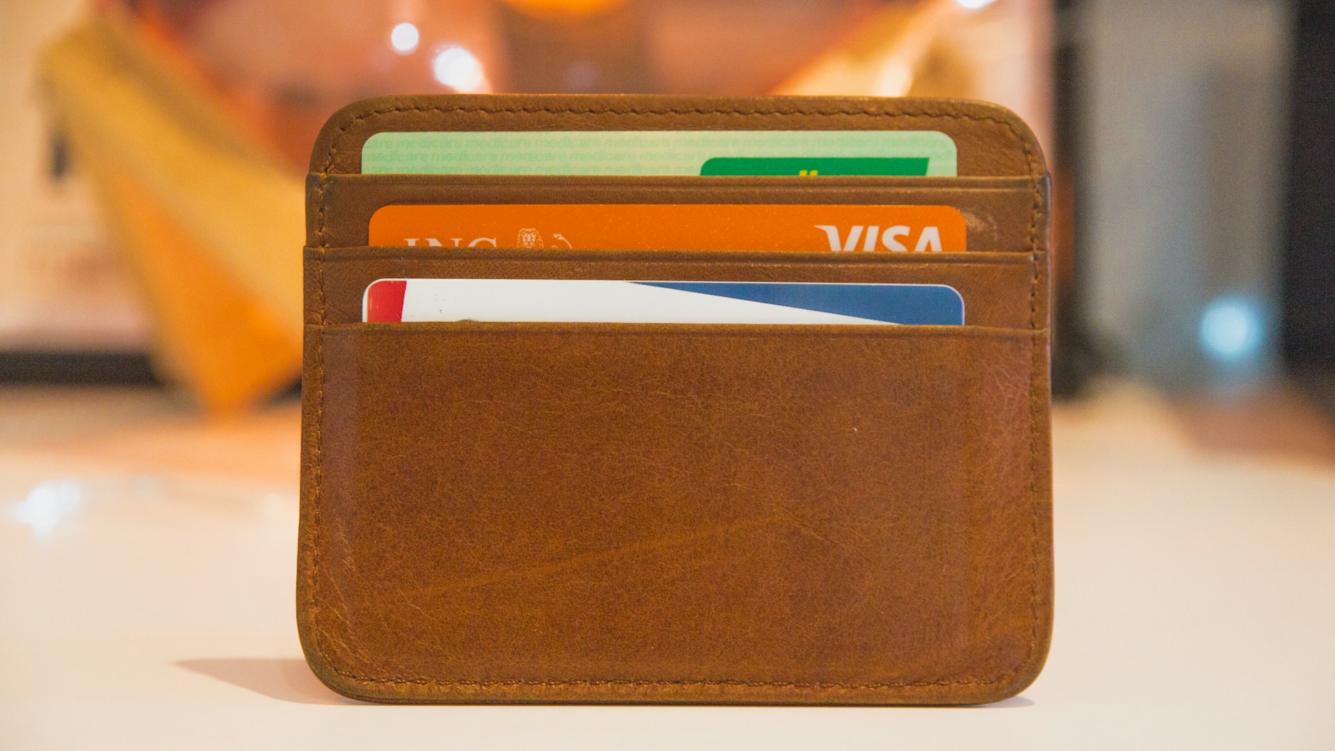 Cards in a wallet representing digital payments and finance